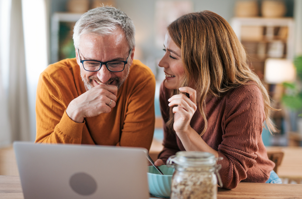 a happy couple is talking about transition to retirement